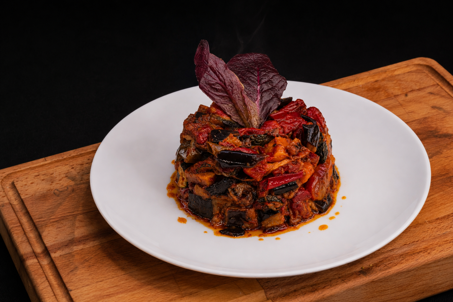 Kizartma — fried eggplant, zucchini and capsicum in a rich tomato sauce, plated at Reyhan